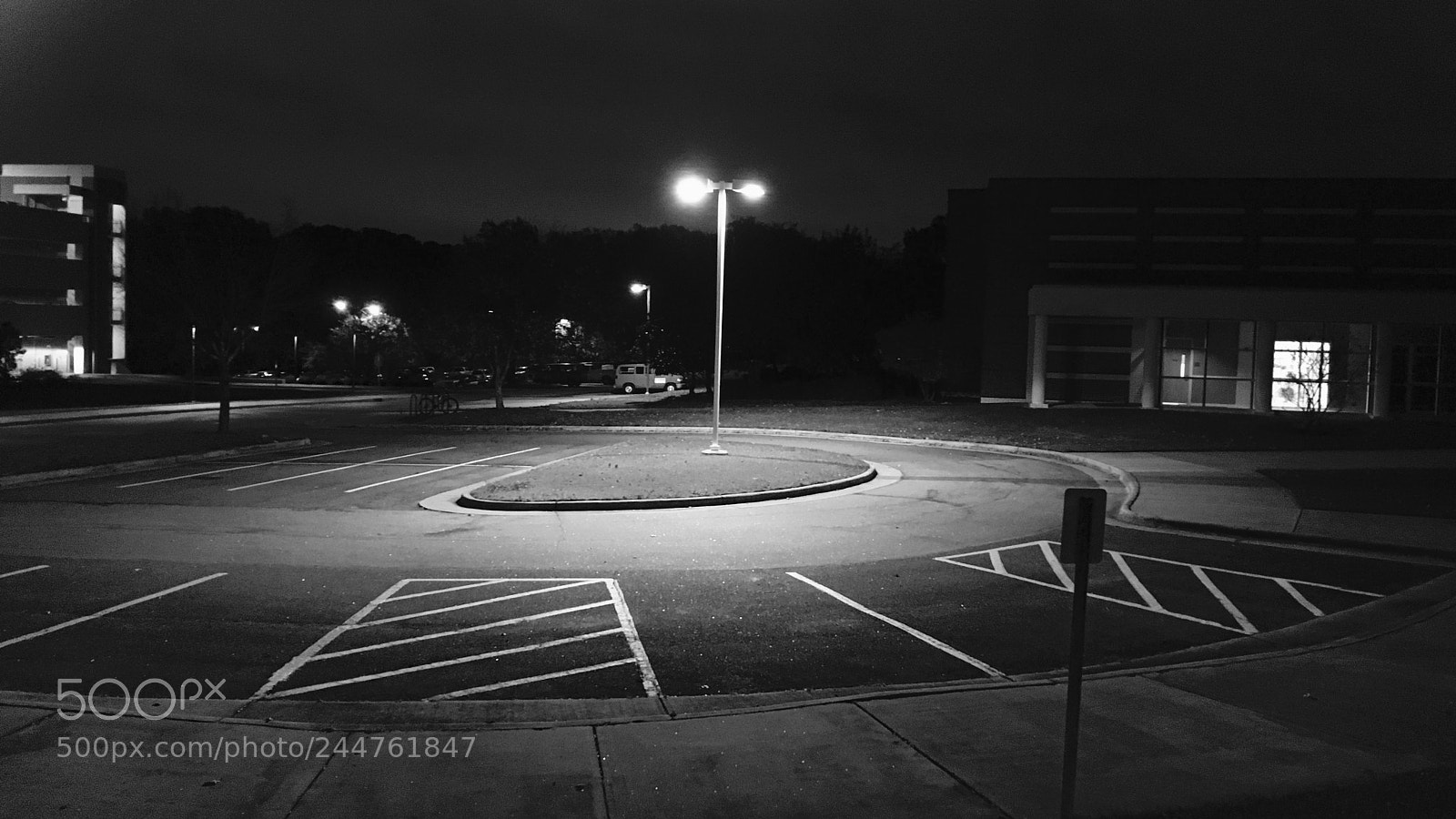 Apple iPhone 6s Plus sample photo. Nighttime parking lot photography