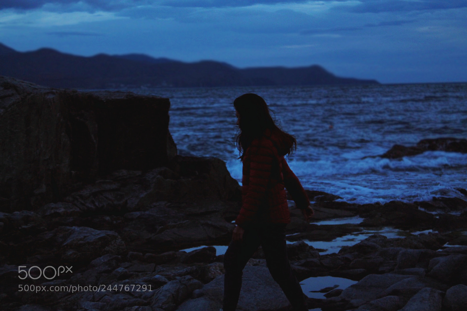 Canon EOS 1100D (EOS Rebel T3 / EOS Kiss X50) sample photo. Girl running across rocks photography