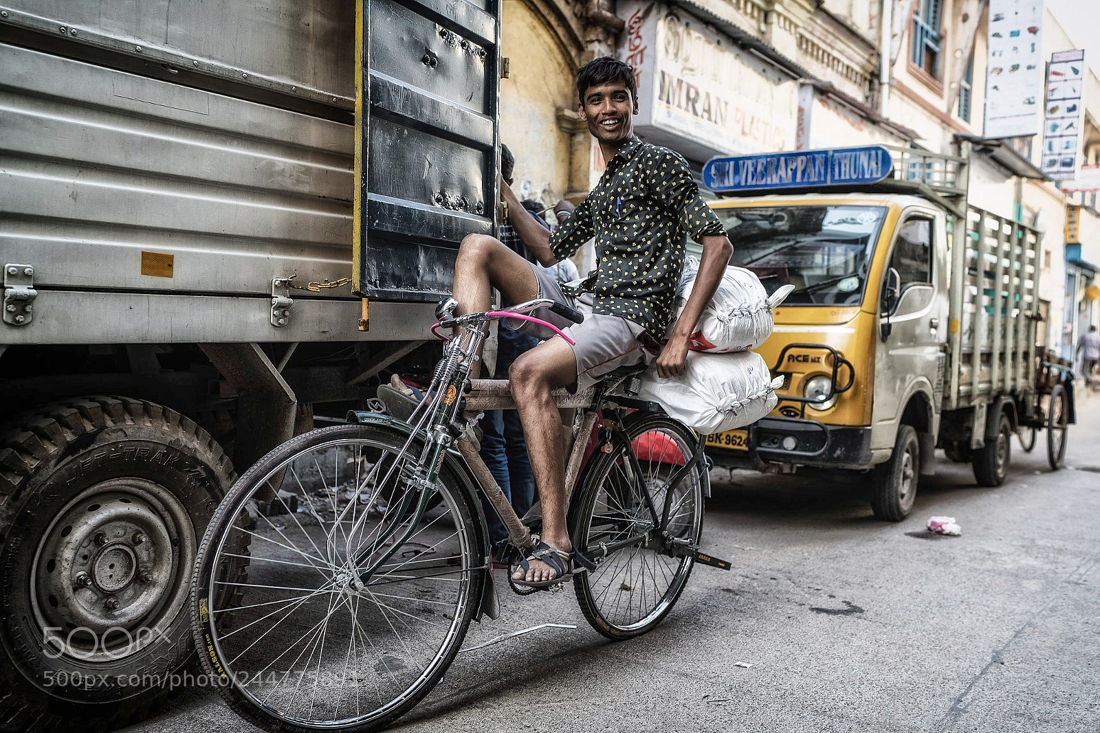 Sony a7R II sample photo. Boy on a bike photography