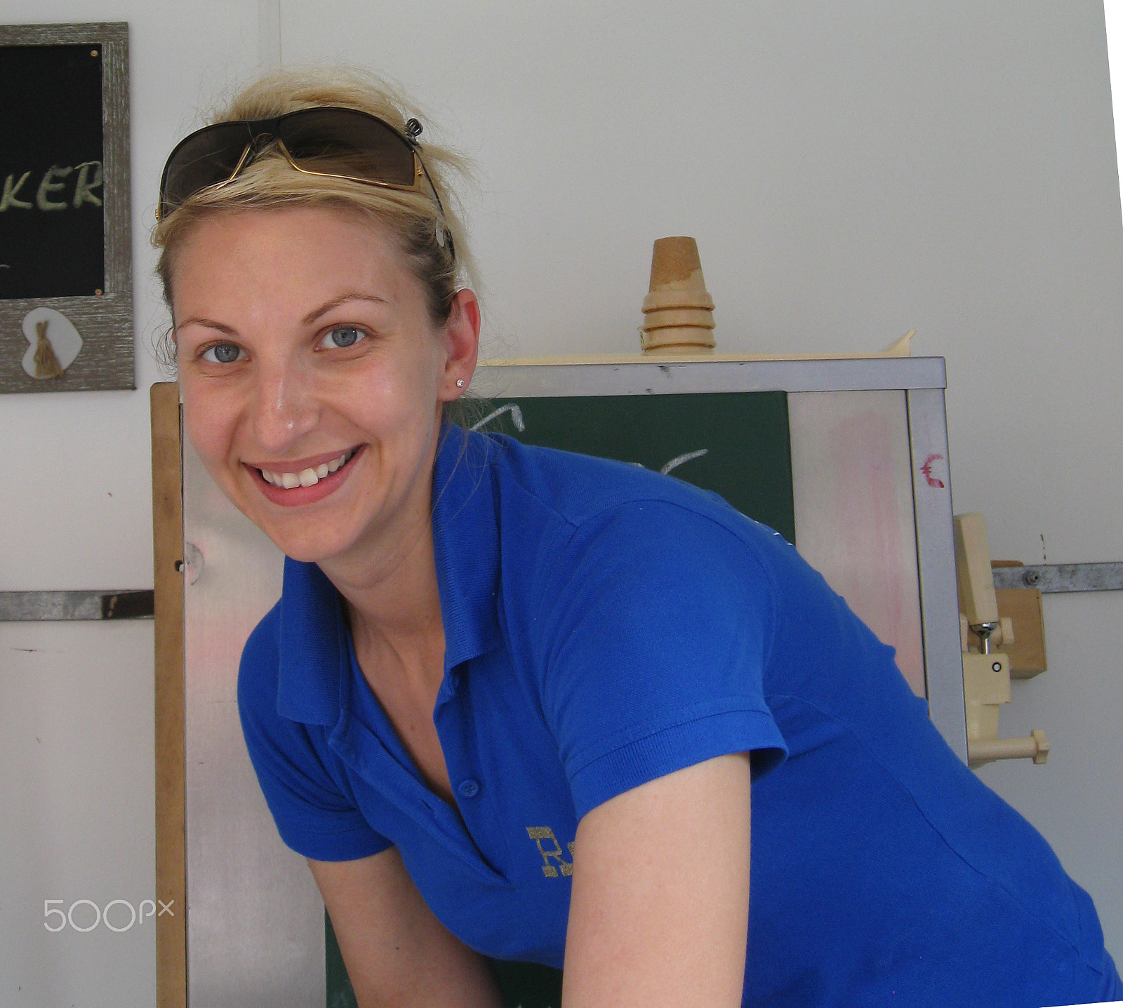 Canon PowerShot A590 IS sample photo. Smiling blonde girl in blue photography