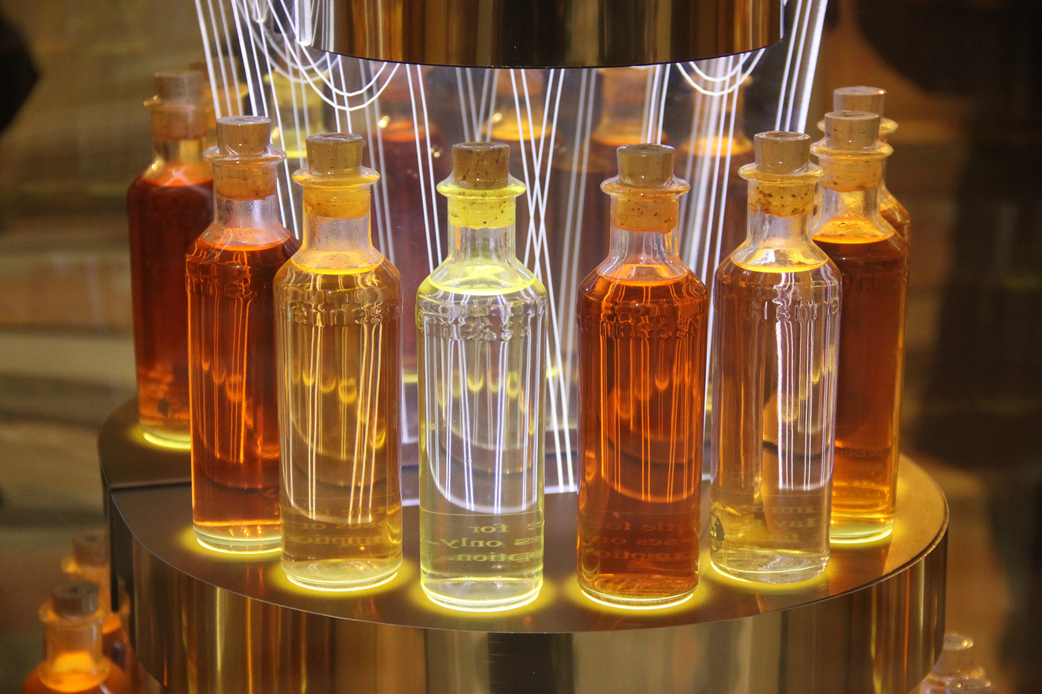 Canon EF-S 18-135mm F3.5-5.6 IS sample photo. Colorful small bottles photography