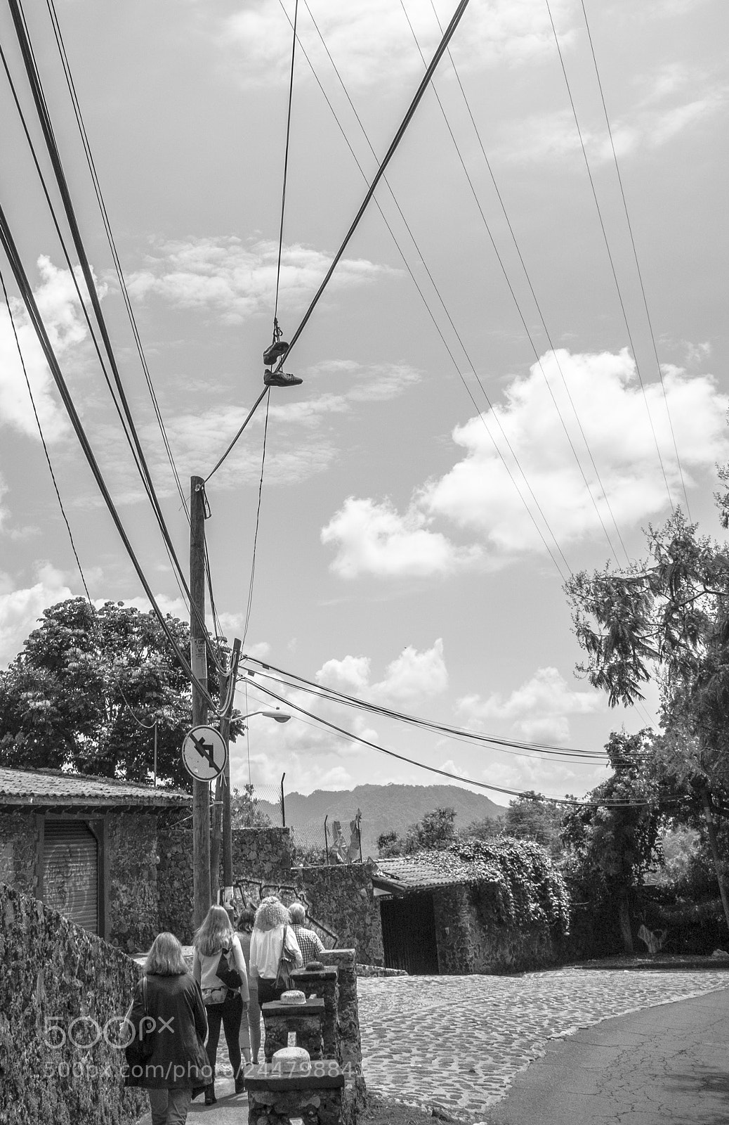 Fujifilm X70 sample photo. Shoes over their heads photography