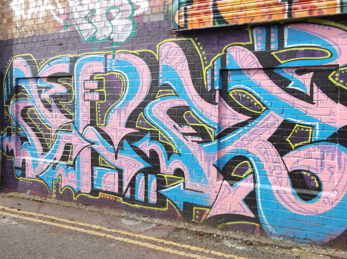 Fujifilm FinePix JV250 sample photo. Pink blue black graffiti (trafalgar lane brighton) photography