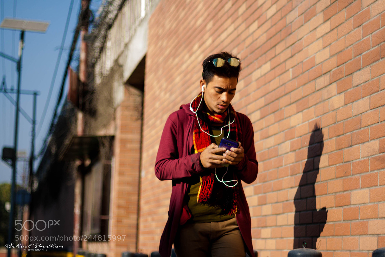 Canon EOS 1000D (EOS Digital Rebel XS / EOS Kiss F) sample photo. Guy with earphones on photography
