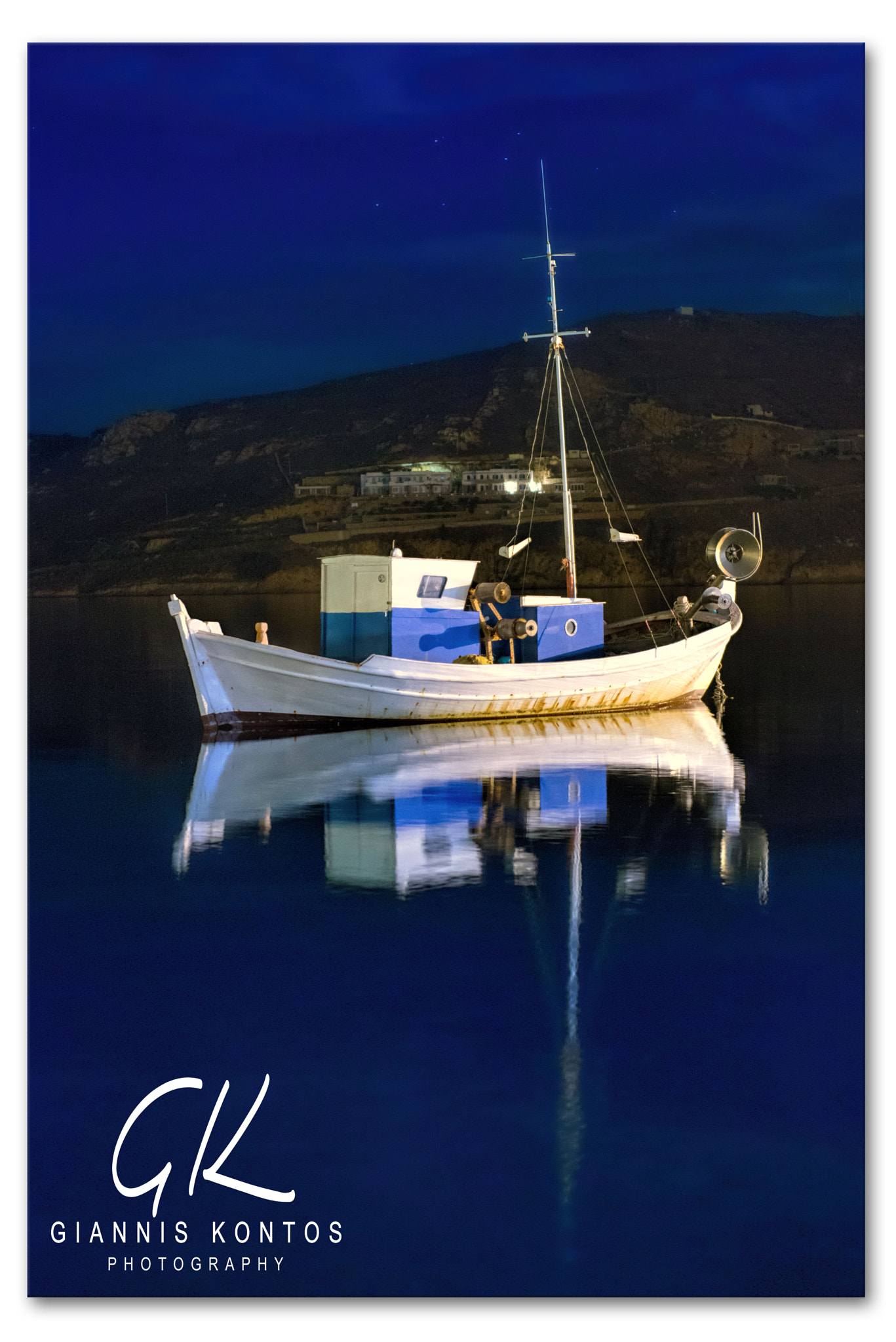 Fishing boat reflection on Serifos Island, Greece