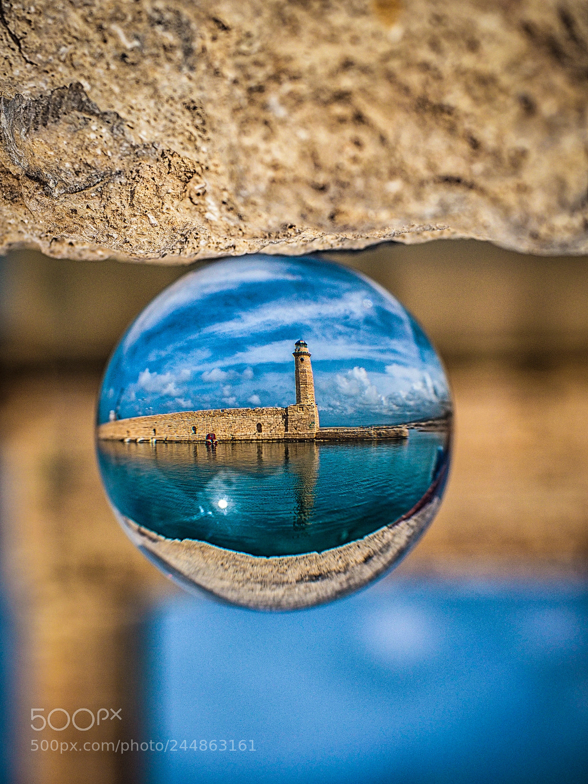 Olympus OM-D E-M10 sample photo. Glass ball lighthouse photography