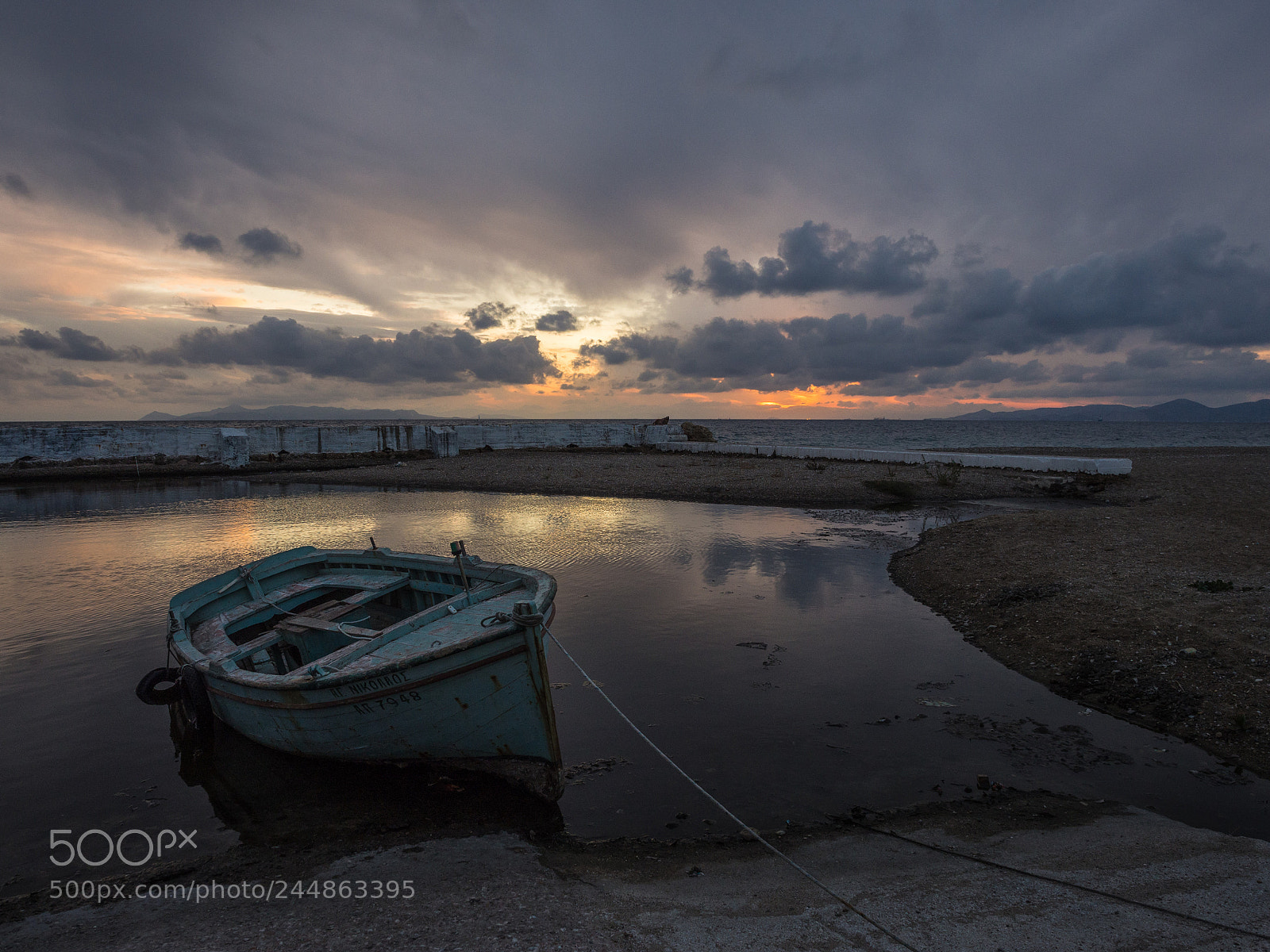 Olympus OM-D E-M10 sample photo. Boat wreck in sunset photography