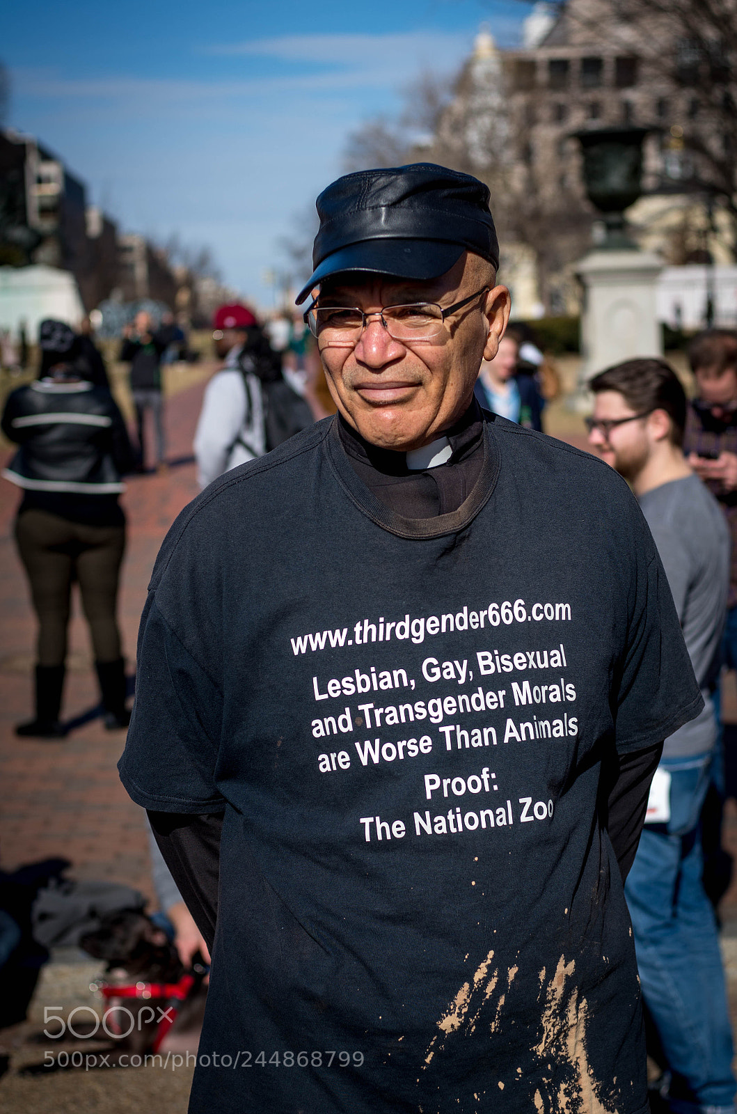 Pentax K-5 IIs sample photo. Walking bigotry billboard photography