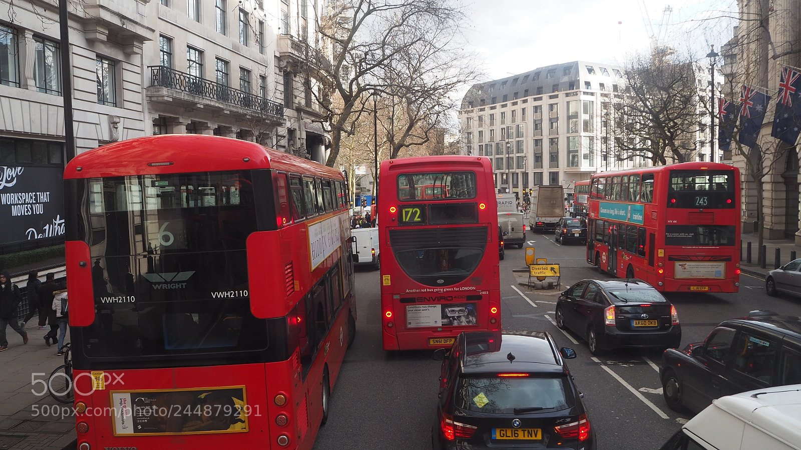 Olympus OM-D E-M10 II sample photo. Red double decker buses photography
