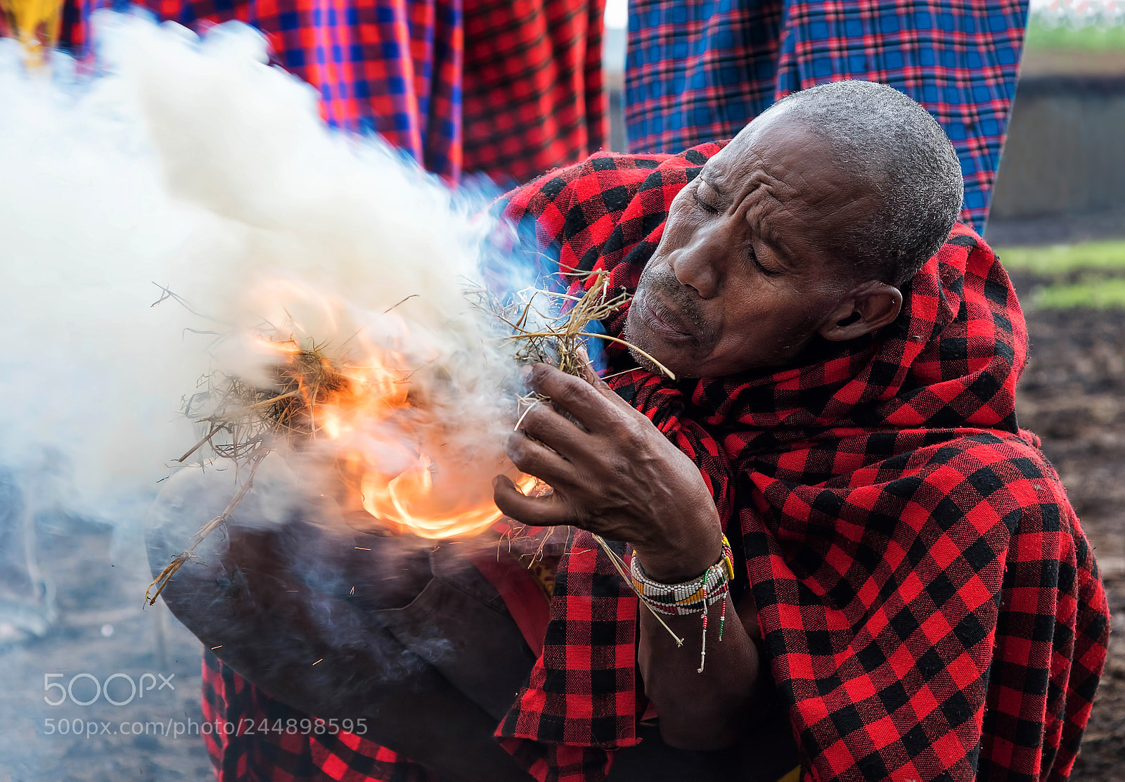 Nikon D810 sample photo. Masai man ignites fire photography
