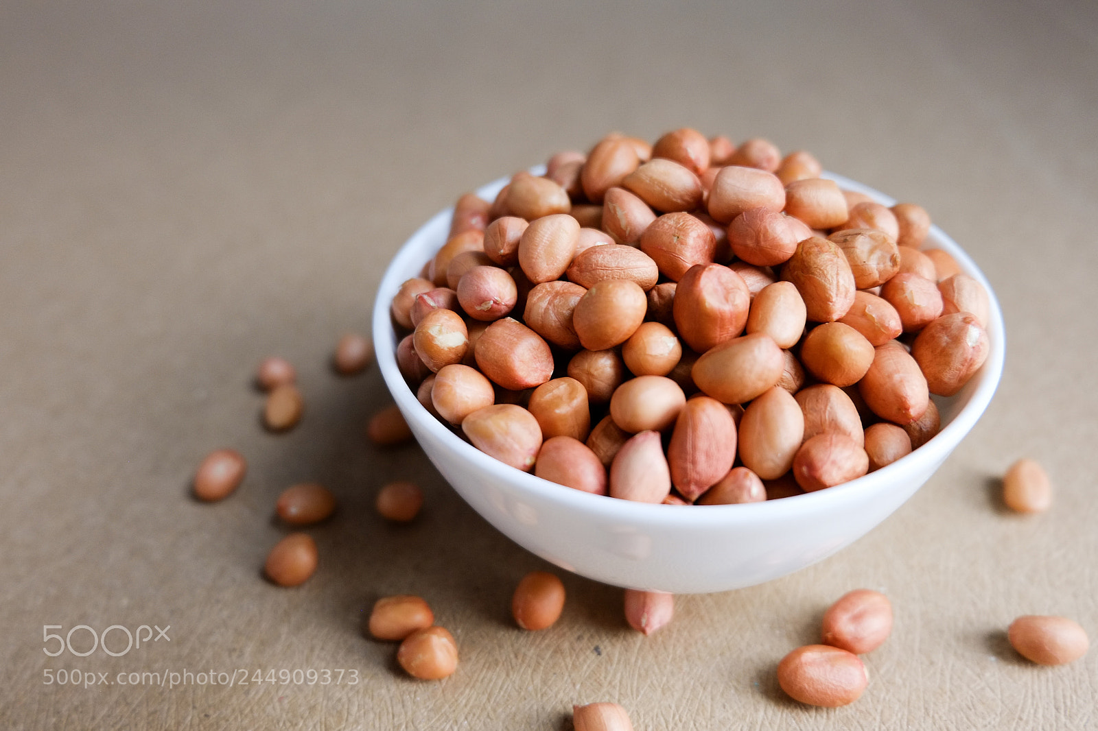 Fujifilm X-E1 sample photo. Peanut in white bowl photography