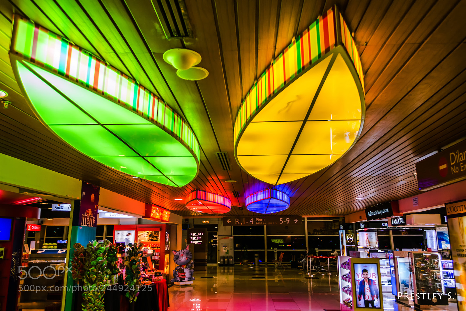 Nikon D3200 sample photo. Colorful airport ceiling lights photography