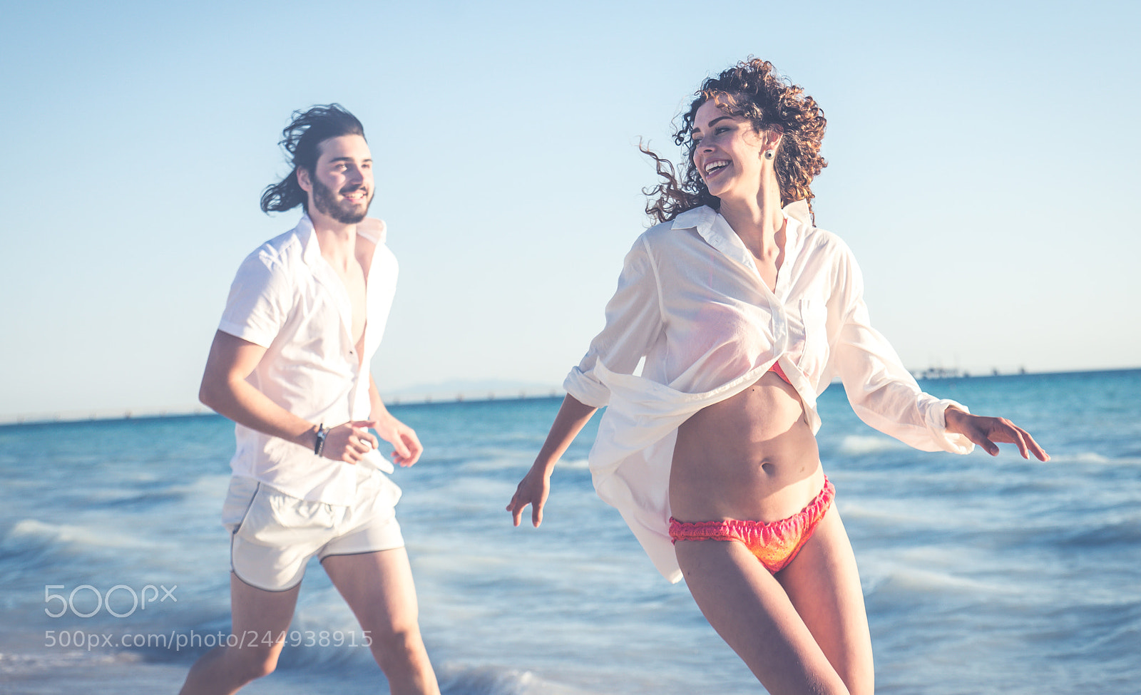 Nikon D610 sample photo. Young couple sharing happy photography