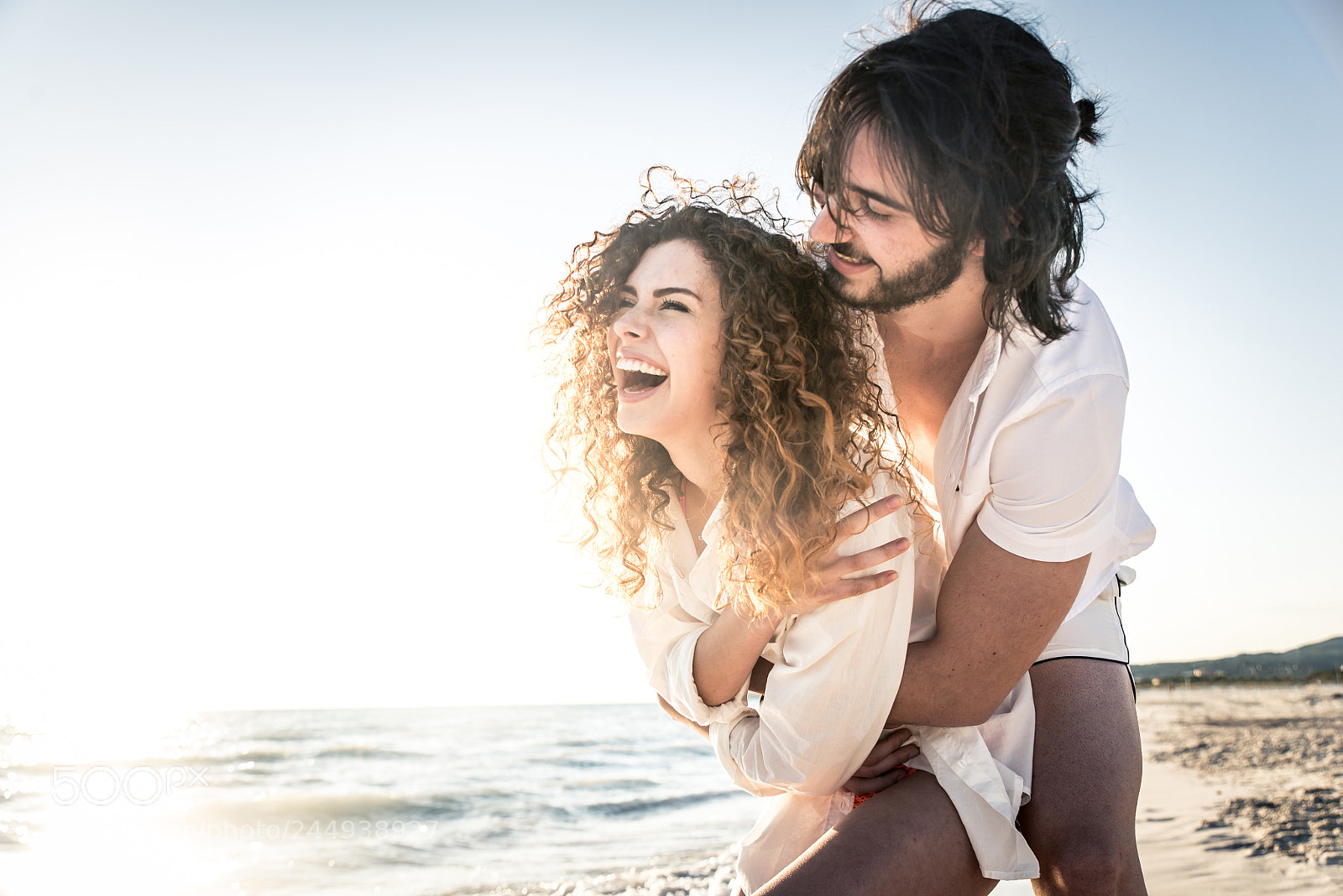 Nikon D610 sample photo. Young couple sharing happy photography