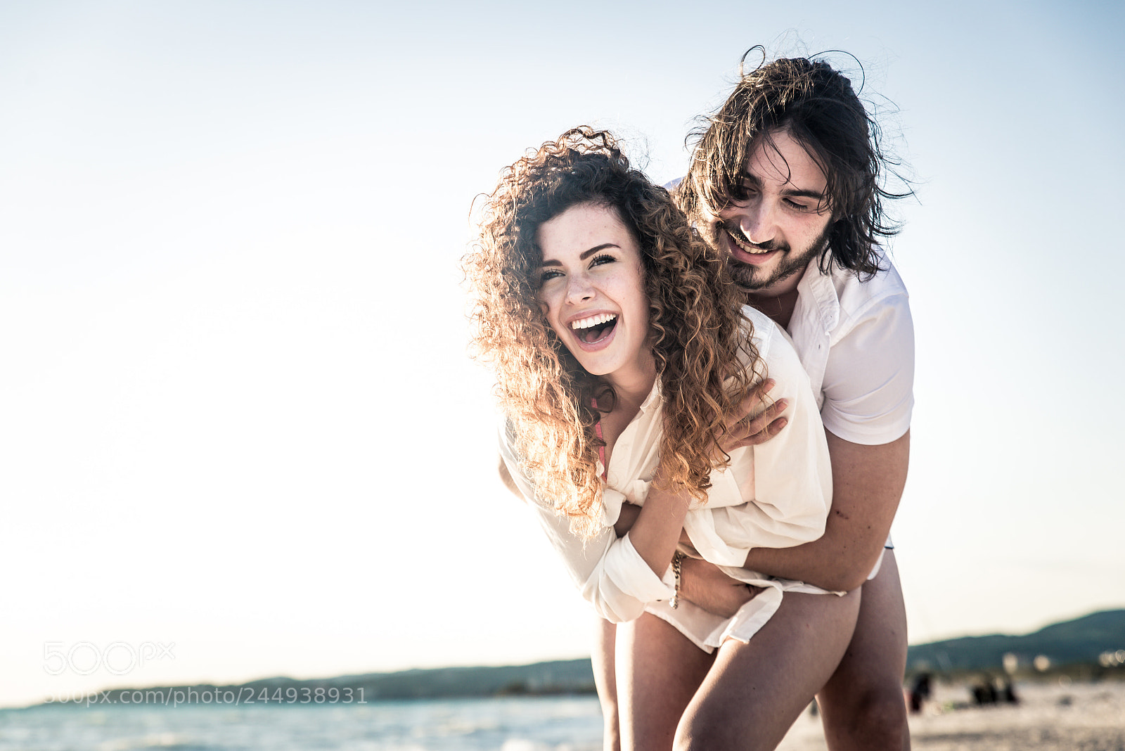 Nikon D610 sample photo. Young couple sharing happy photography