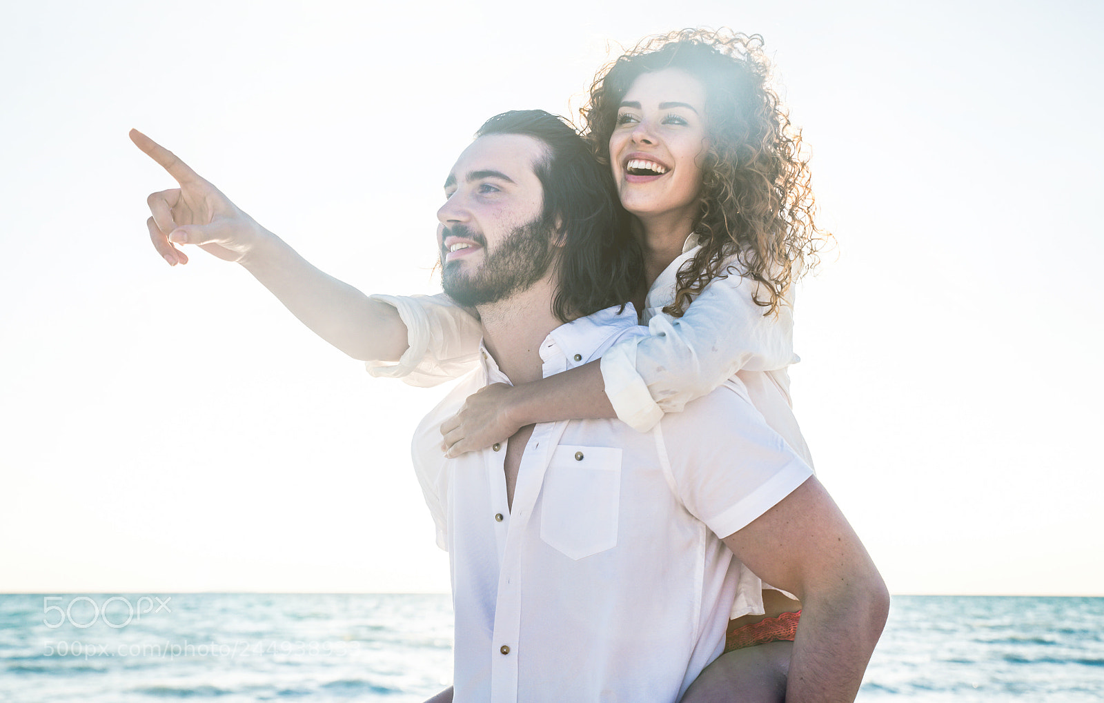 Nikon D610 sample photo. Young couple sharing happy photography