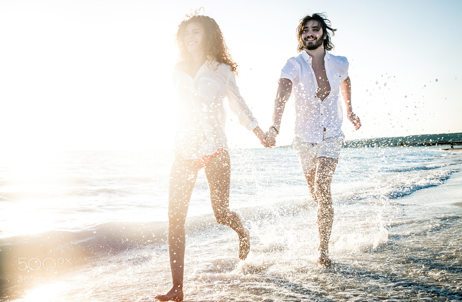 Nikon D610 sample photo. Young couple sharing happy photography