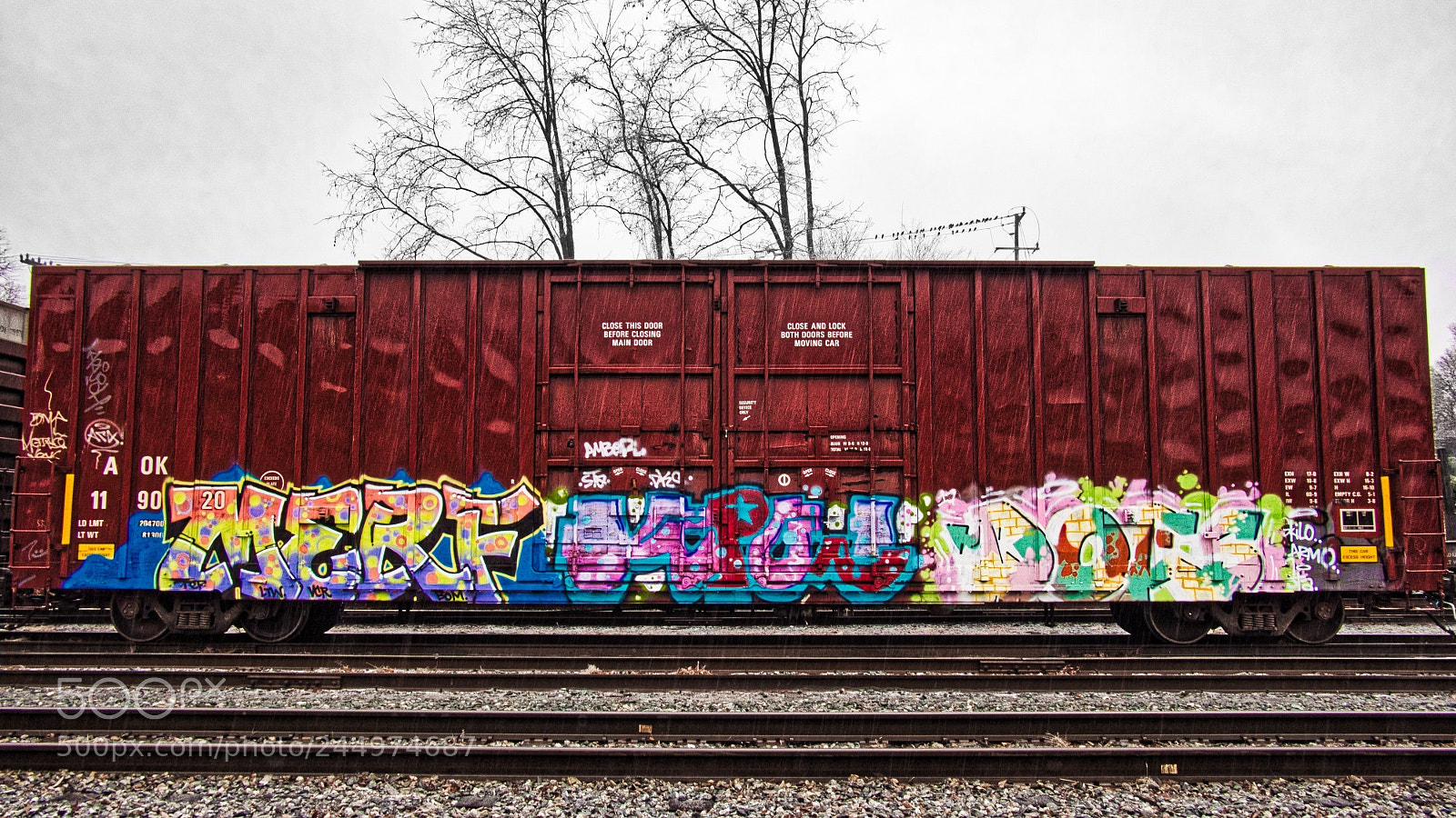 Olympus OM-D E-M10 sample photo. Rainy day graffiti photography