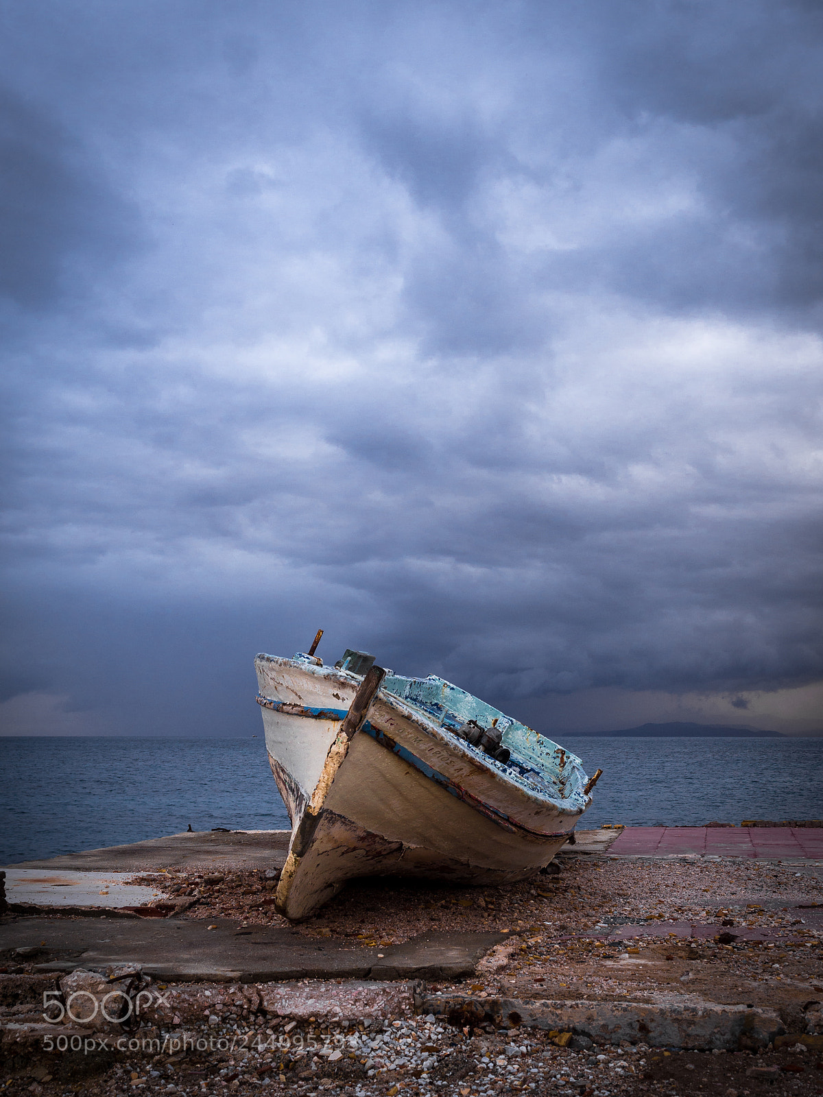 Olympus OM-D E-M10 sample photo. Lonely boat photography