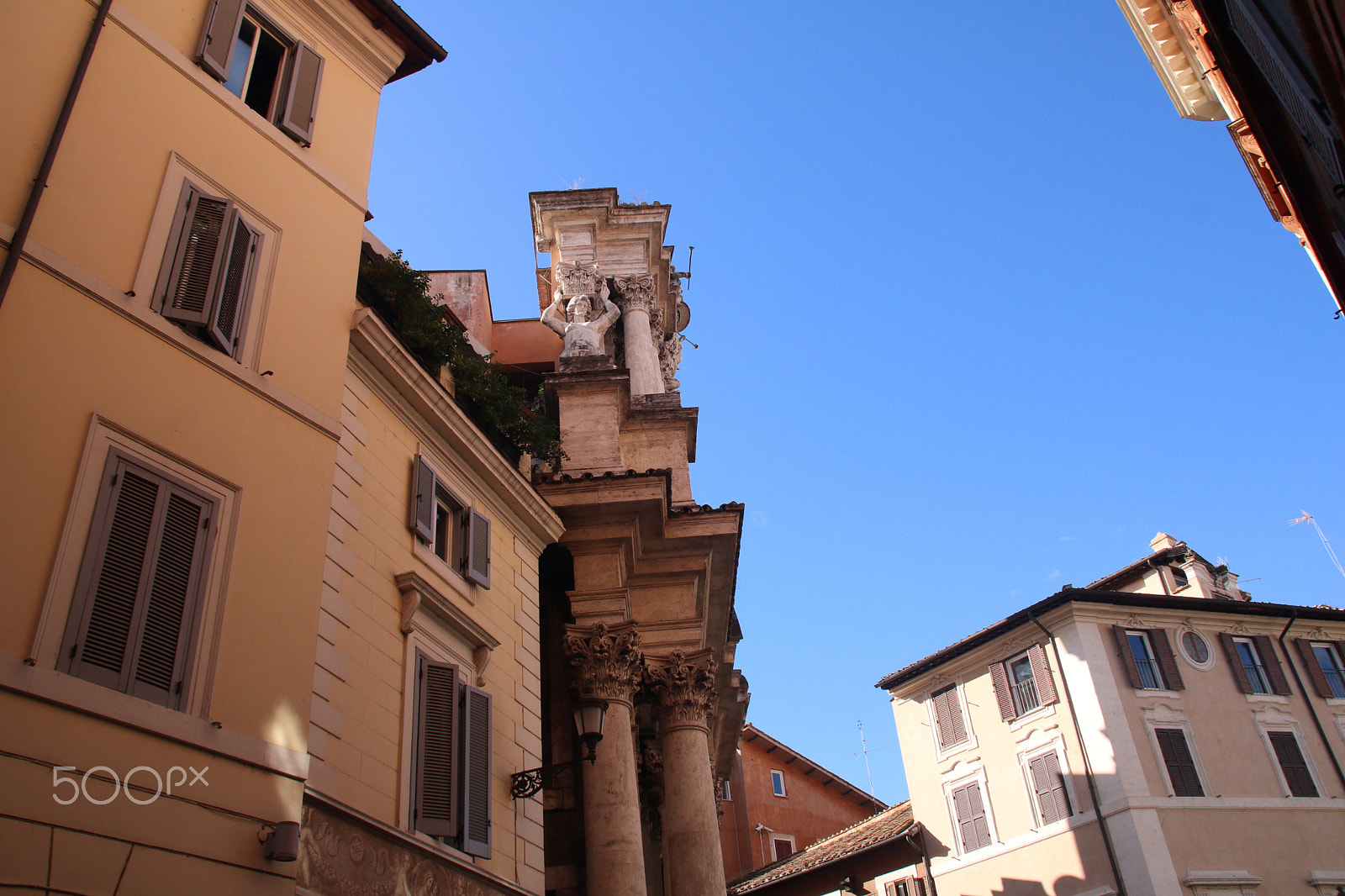 Sigma 18-200mm f/3.5-6.3 DC OS sample photo. From out of nowhere, columns photography