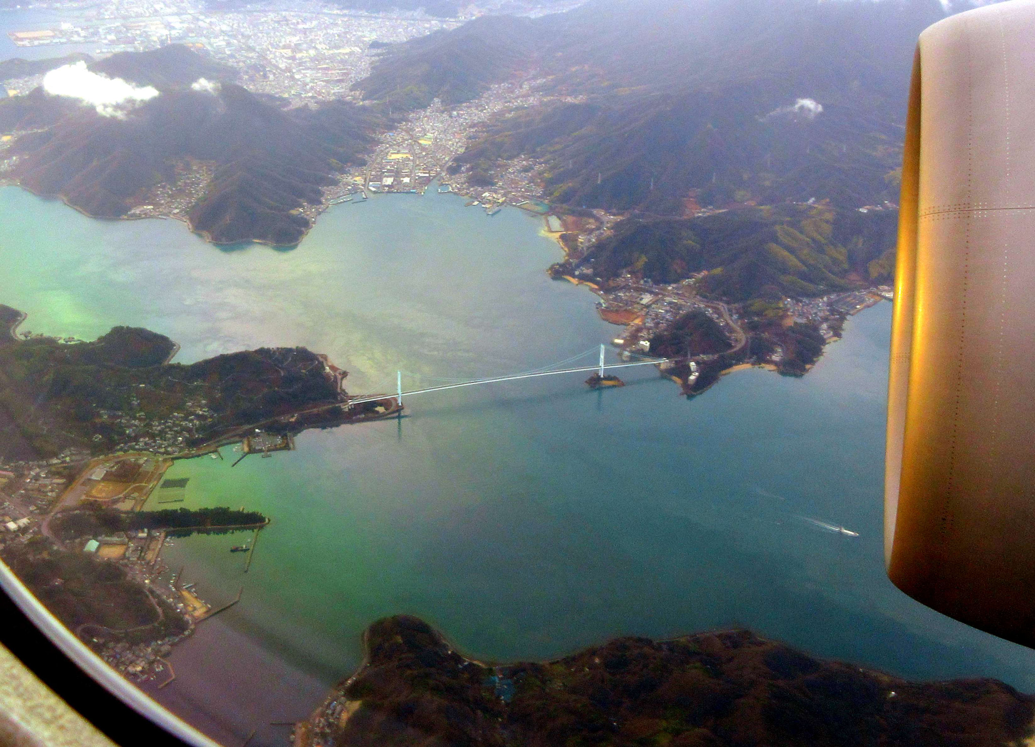Canon PowerShot ELPH 360 HS (IXUS 285 HS / IXY 650) sample photo. The bridge is visible from the window of an airplane photography
