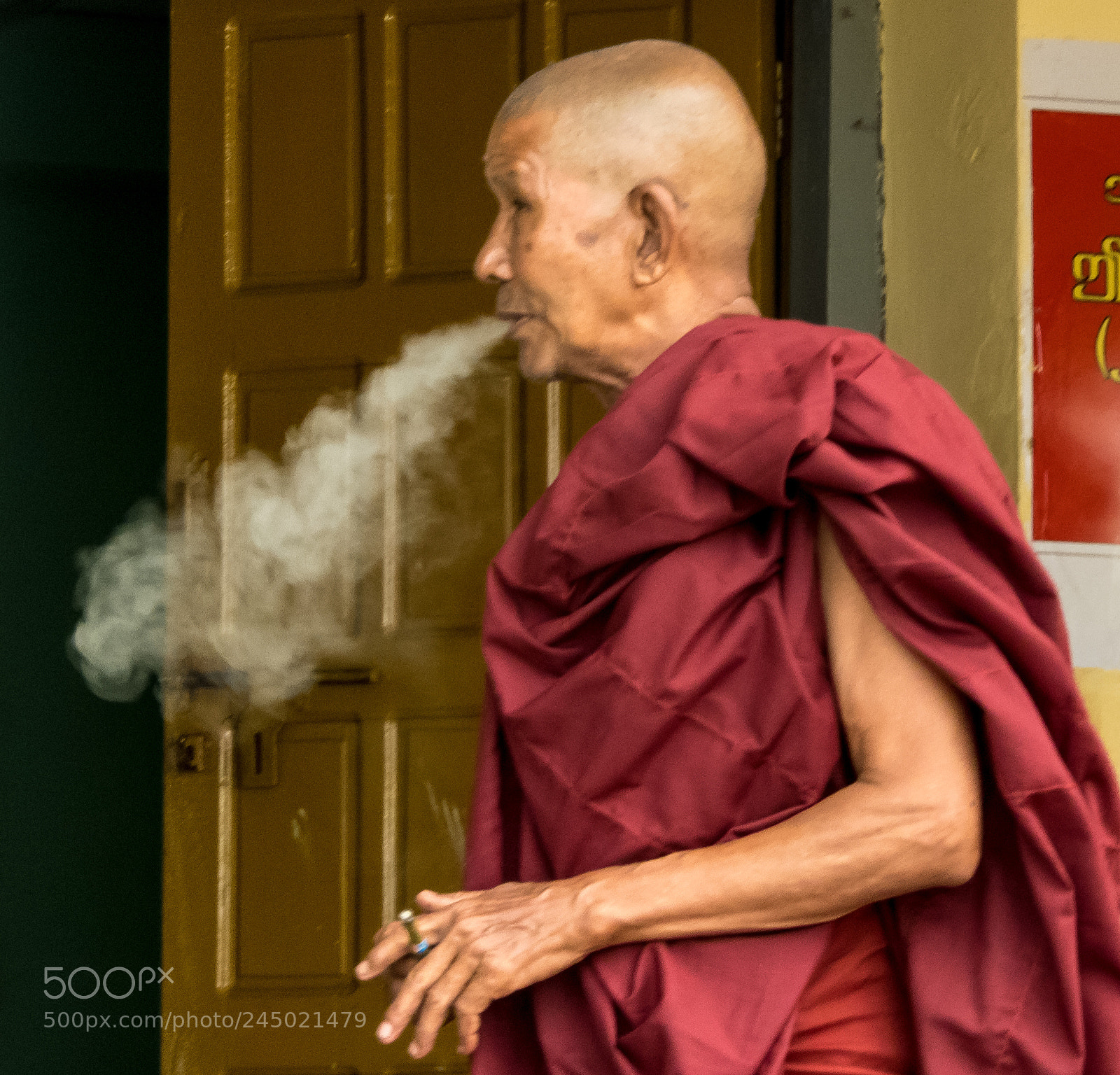 Nikon Coolpix B700 sample photo. Smoking monk. myanmar photography