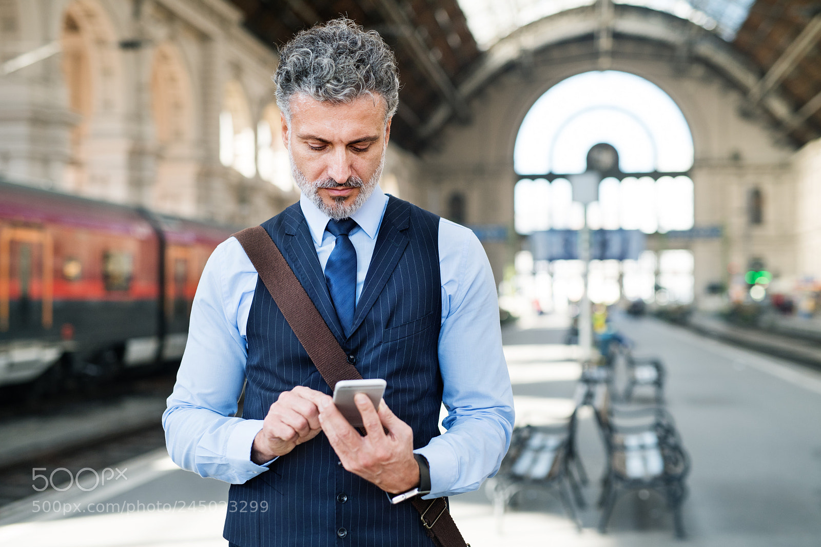 Nikon D5 sample photo. Mature businessman with smartphone photography