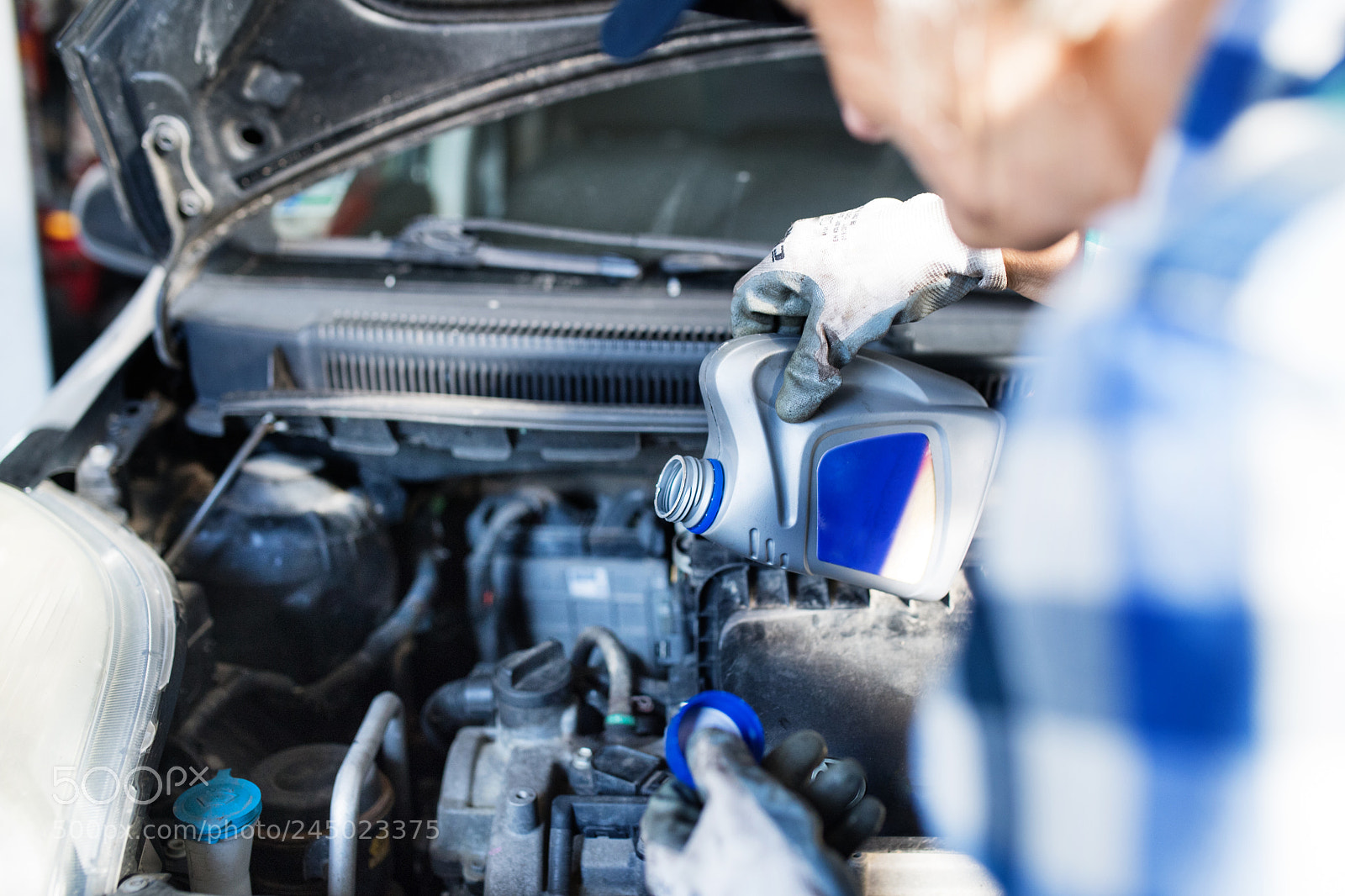 Nikon D5 sample photo. Senior female mechanic repairing photography