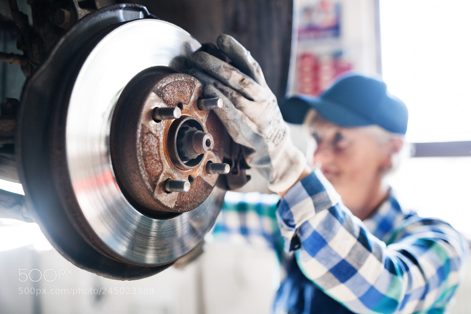 Nikon D5 sample photo. Senior female mechanic repairing photography