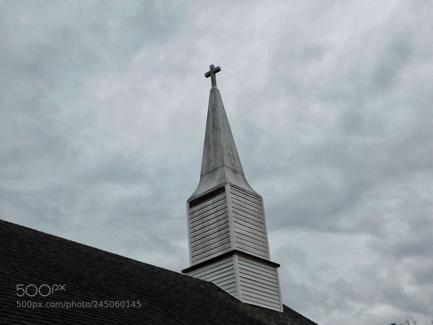 Nikon Coolpix B500 sample photo. Cloudy sky and steeple photography