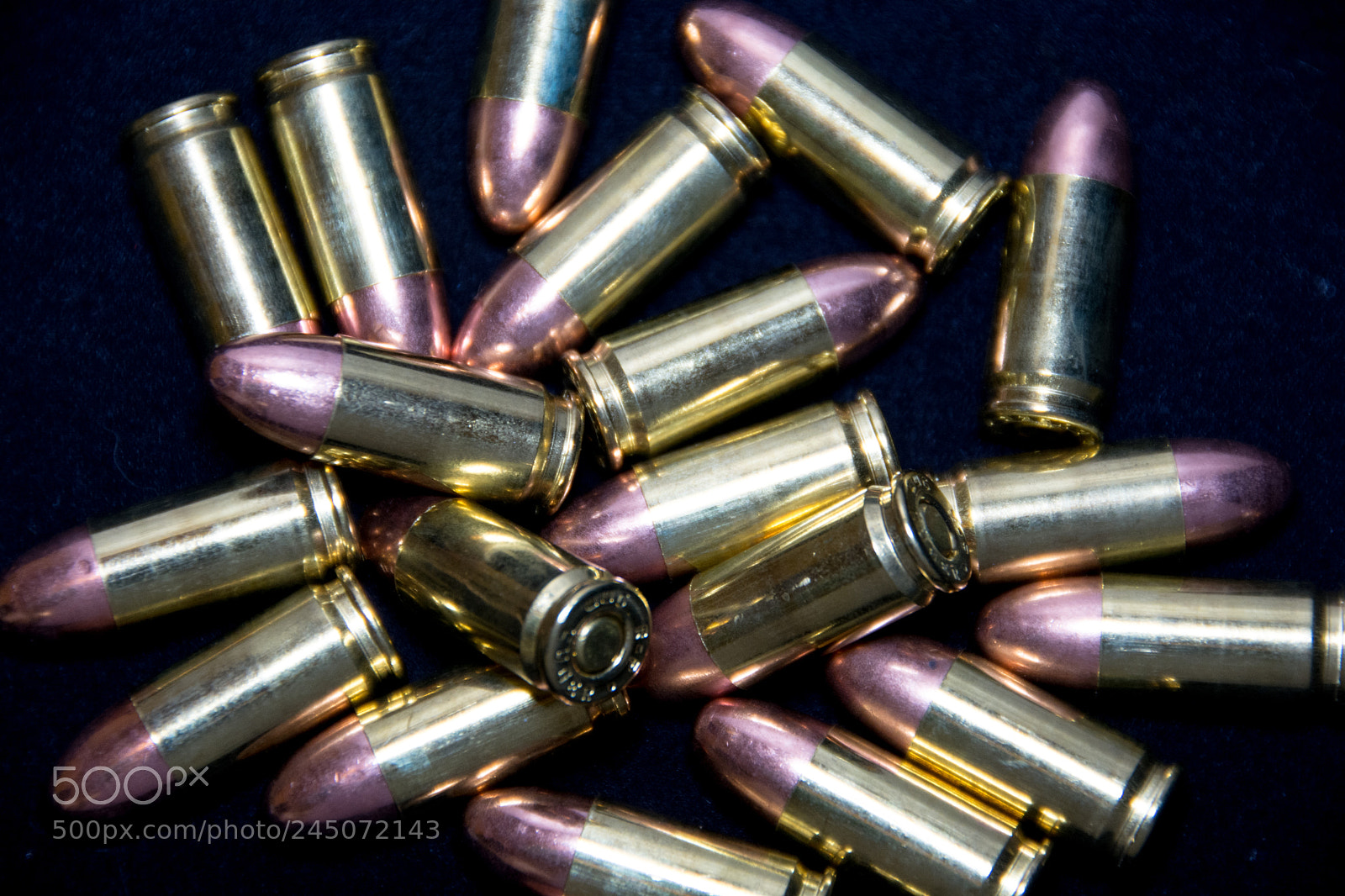 Nikon D7100 sample photo. Cluster of 9mm ammo photography