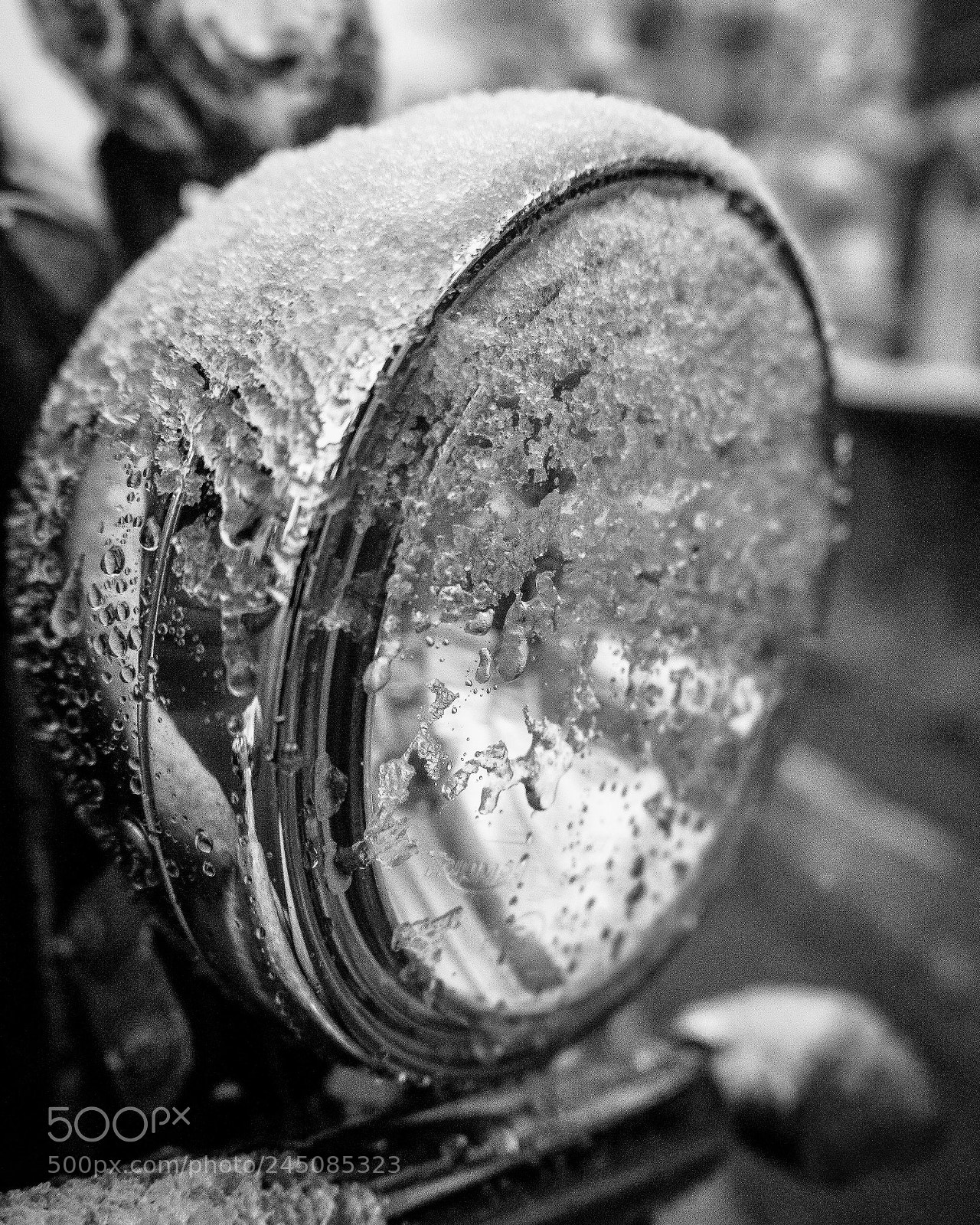 Sony a7 sample photo. Triumph headlight under snow photography
