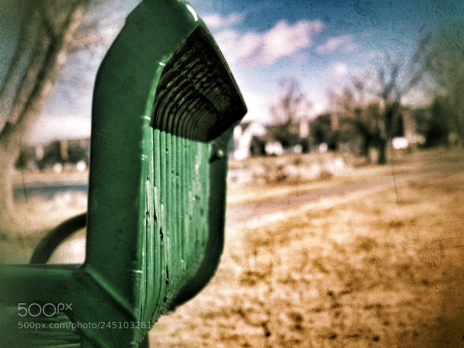 Olympus OM-D E-M10 II sample photo. Bench by the pond photography