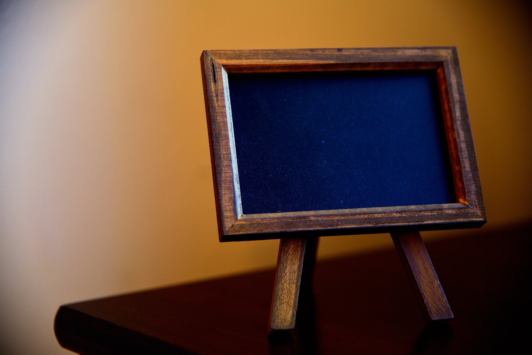 Nikon AF-S Nikkor 24-120mm F4G ED VR sample photo. A lone unwritten board seeking a reflection photography