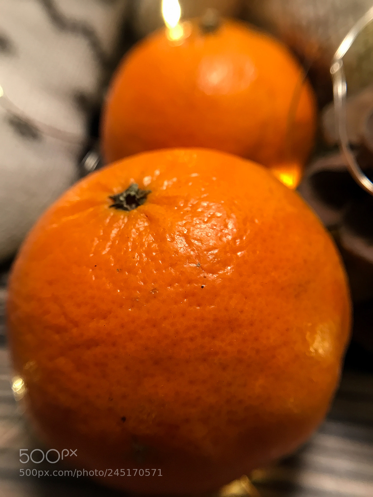 Apple iPhone 7 Plus sample photo. Orange mandarins and garlands photography