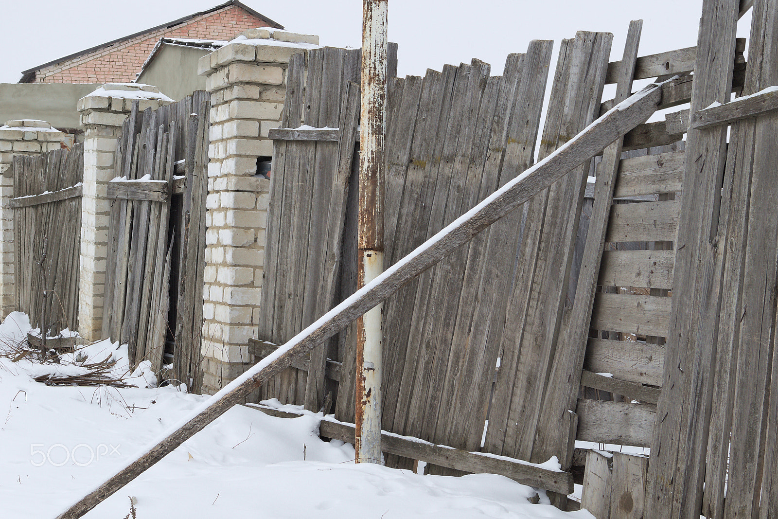 Canon EOS M10 sample photo. Wooden fence on a winter morning photography