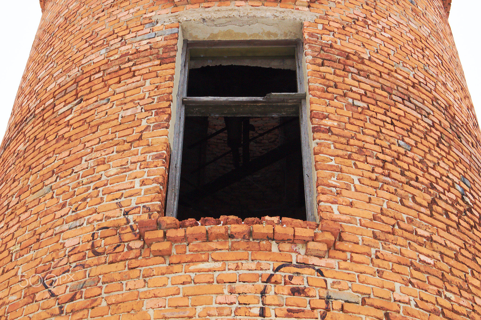 Canon EOS M10 sample photo. Red brick water tower in the winter morning photography