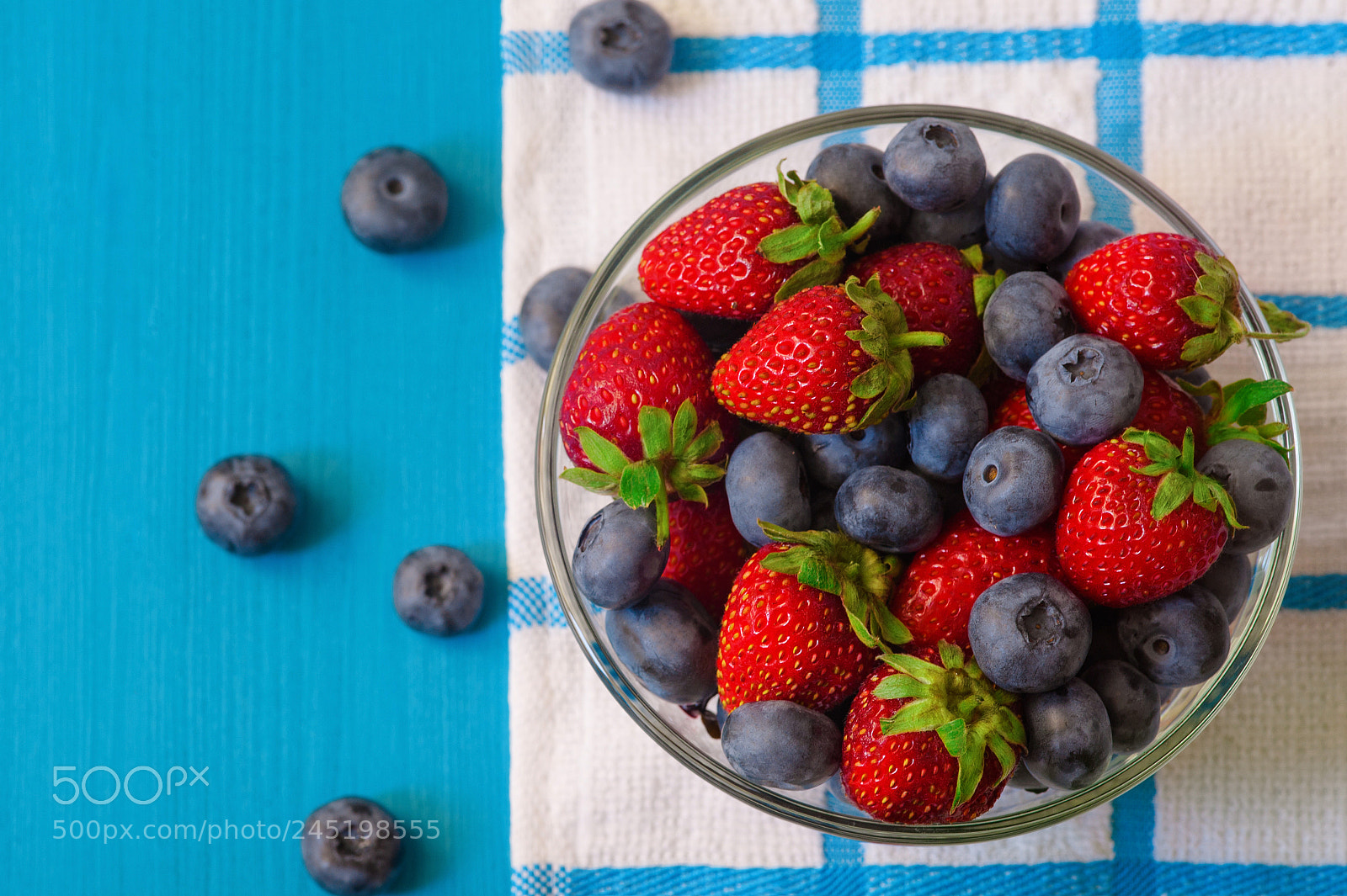 Nikon D700 sample photo. Berries on wooden background photography