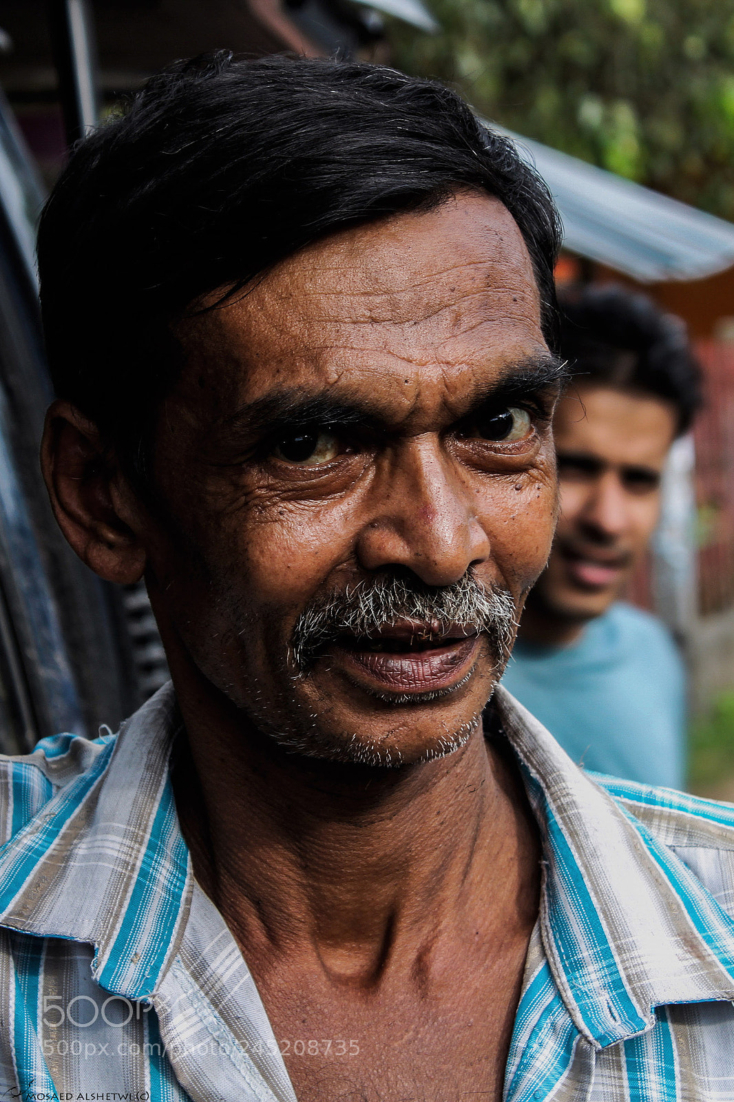 Canon EOS 500D (EOS Rebel T1i / EOS Kiss X3) sample photo. A smiling man photography