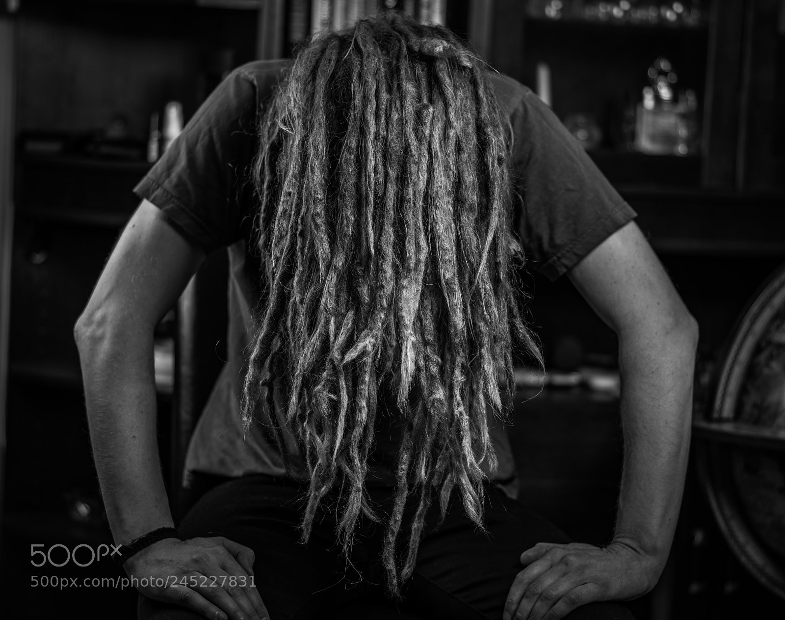 Sony a99 II sample photo. Man with dreads covering photography
