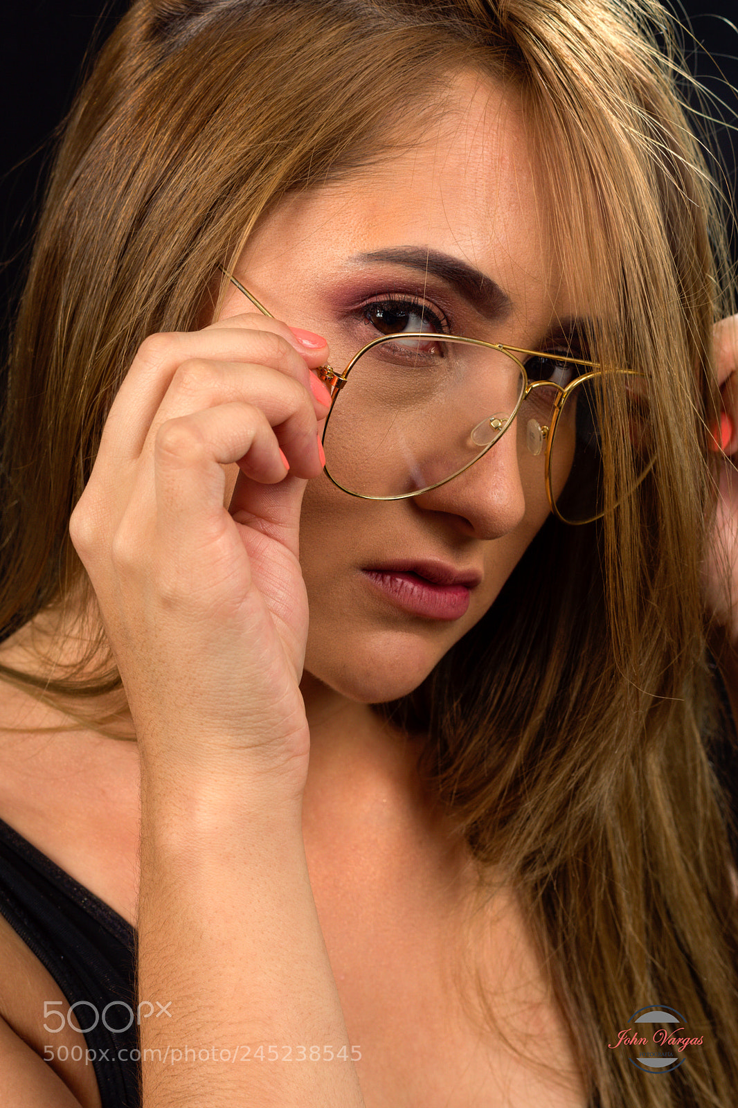 Sony SLT-A68 sample photo. Rubia con lentes photography