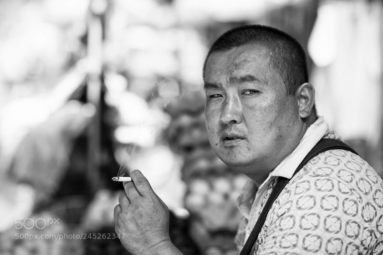 Nikon D800E sample photo. A chinese man smoking photography