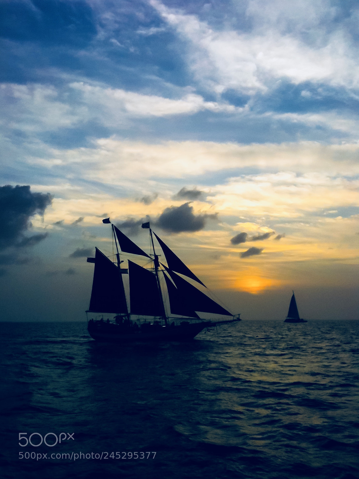 Apple iPhone sample photo. Ship at sunset photography