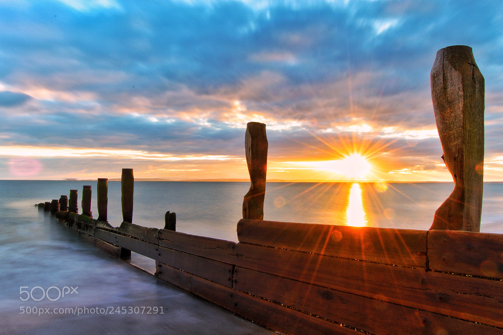 Nikon D3200 sample photo. Long shore drifting sunset photography