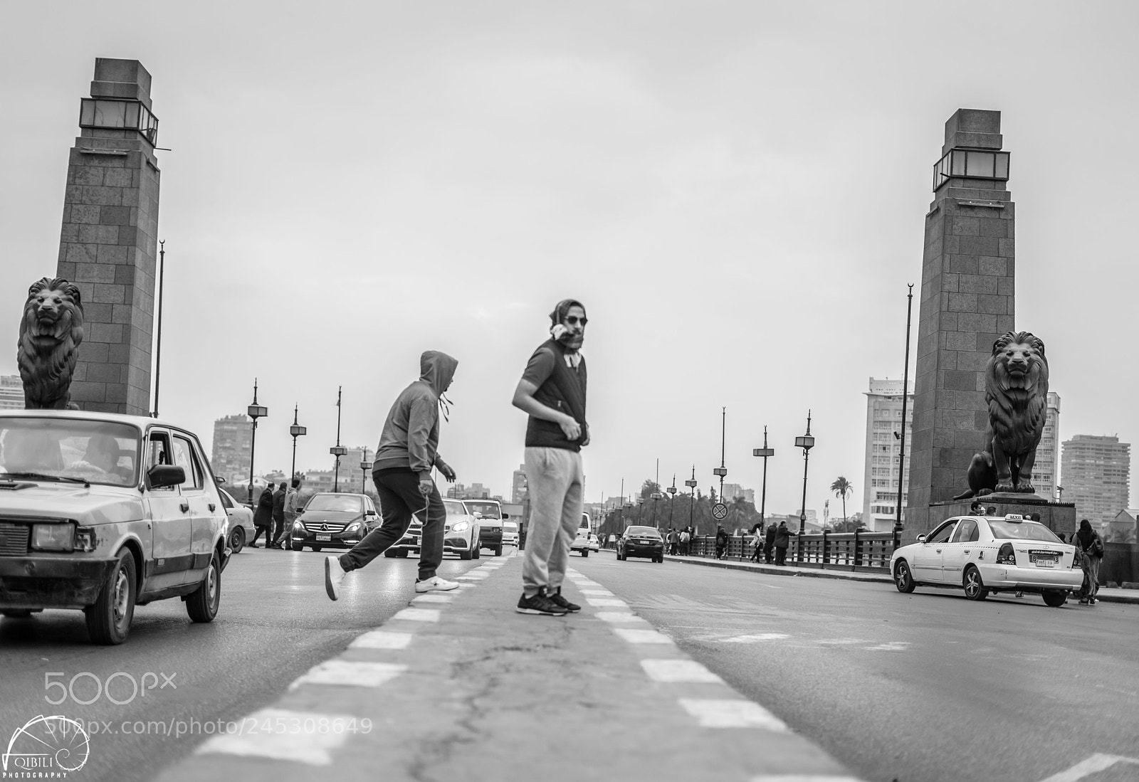 Sony a7 II sample photo. Crossing the road at photography