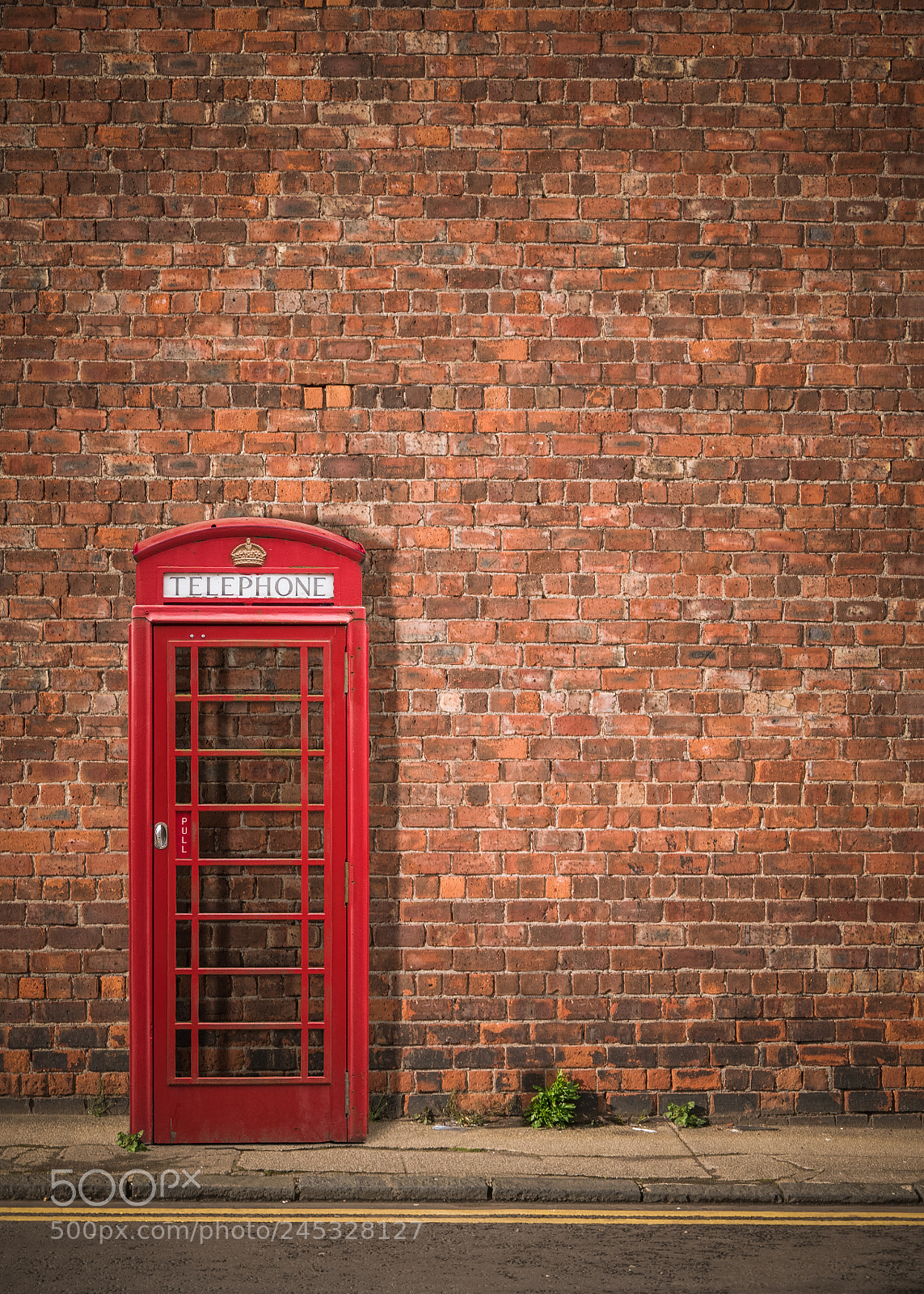 Panasonic Lumix DMC-LX100 sample photo. British phonebox against red photography