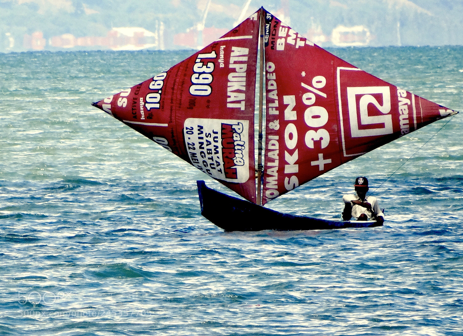 Sony Cyber-shot DSC-HX300 sample photo. Fisherman in sailing boat. photography