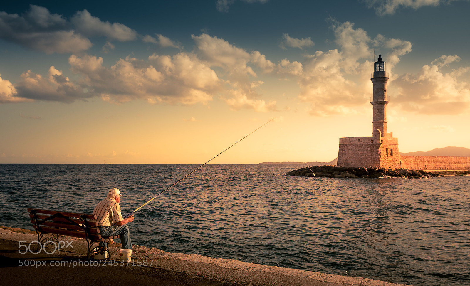 Nikon D610 sample photo. Chania's lighthouse fisherman photography