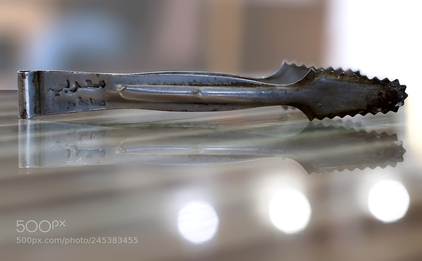 Nikon D90 sample photo. Tongs for coal photography