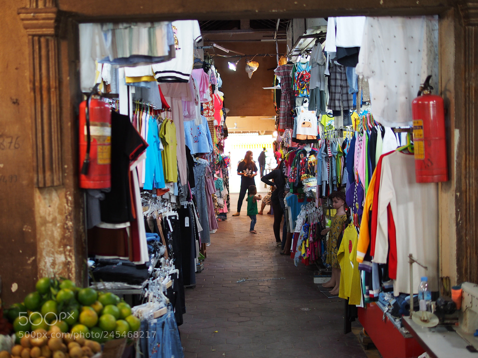 Olympus PEN E-PL5 sample photo. Market selling clothes photography
